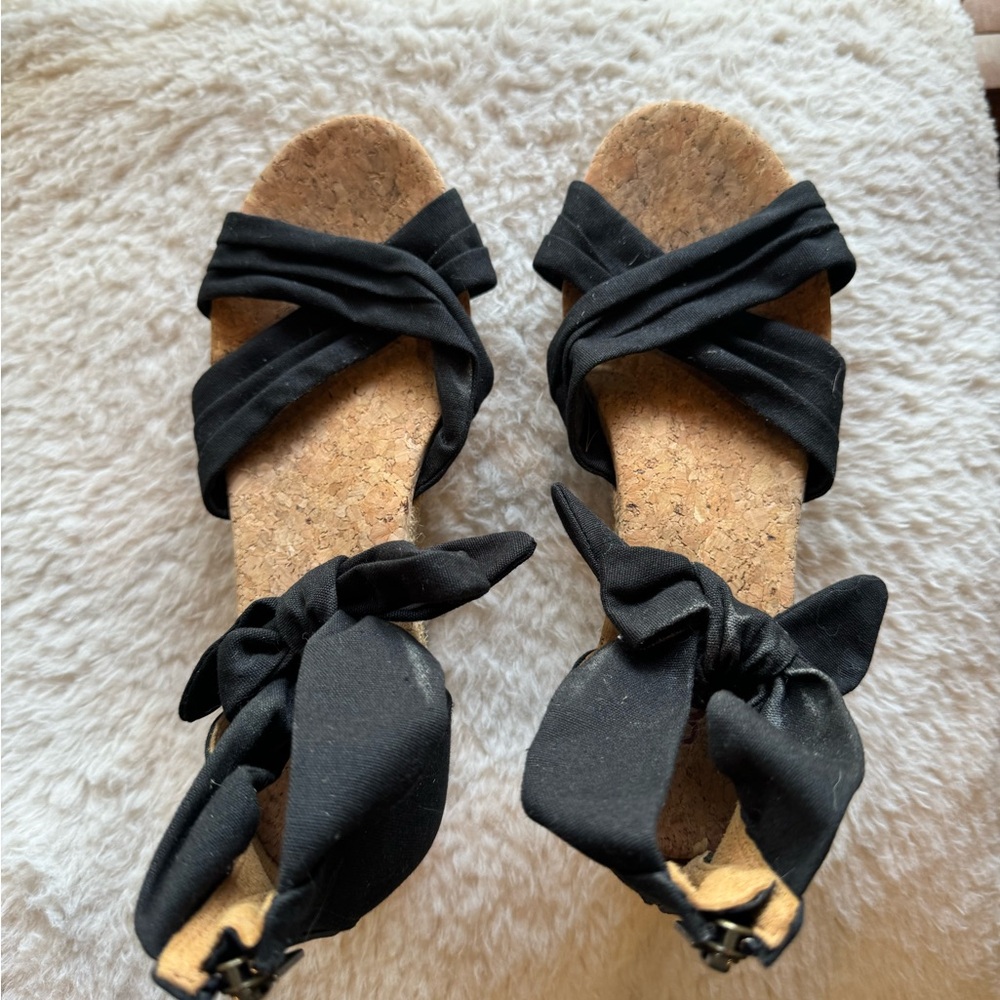 UGG wedge heels. They are a women’s size 7.5.